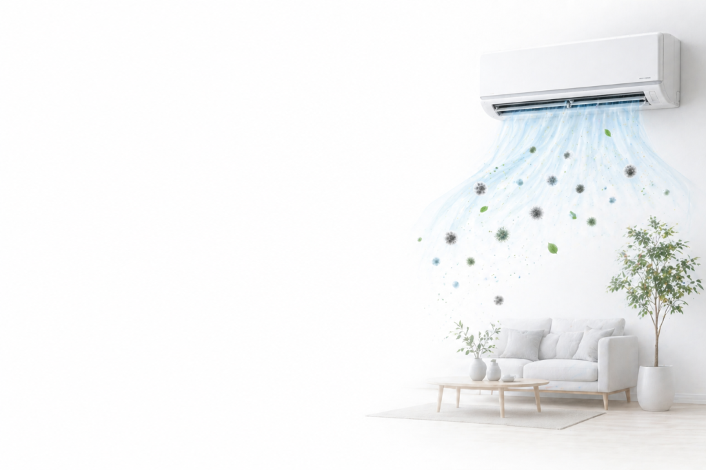 A wall-mounted mini-split AC unit in a bright minimalist living room with illustrated blue airflow lines carrying mold spores, bacteria, and particulate matter into the room